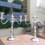 An Unused Pair of 20th Century (Circa 1950) Mappin and Webb Silver- plate  Candelabra with Sconces and a Central Snuffer