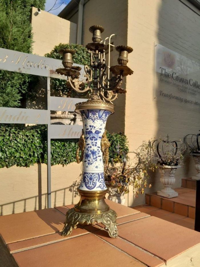 A 20th Century Dutch Delft Porcelain And Brass Candelabra