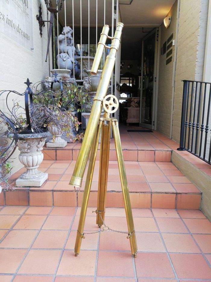 A 20TH Century Victorian-Style Brass Telescope With Brass-Chained Lens Cap On A Brass Tripod With Numbered Wheel Mechanism