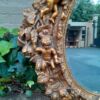 A 20th Century Baroque Style Heavily Carved And Ornate Gilt-Framed Bevelled Glass Mirror - Image 3