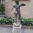 A 20th Century Very Large Bronze And Concrete Highly Decorative Statue Of A Cherub On Concrete Column Base
