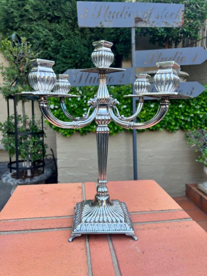 A 20th Century Italian Silver. Candelabra With Drip Holders