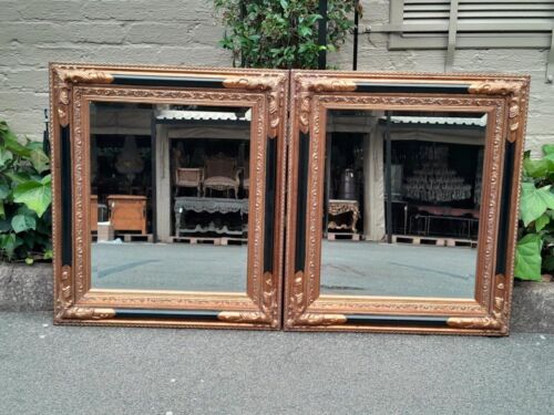 A 20th Century Pair Of French Empire-Style  Ebonised And Gilt-Painted Mirrors