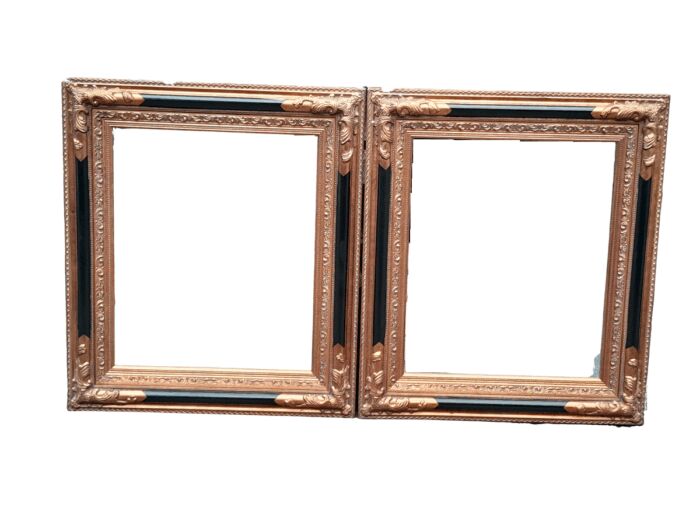 A 20th Century Pair Of French Empire-Style  Ebonised And Gilt-Painted Mirrors