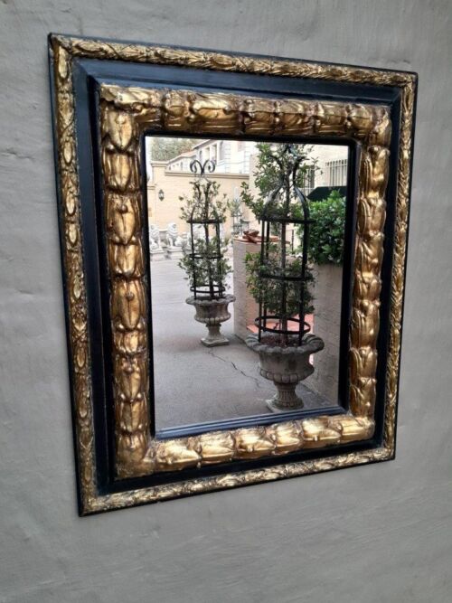 A 20th Century Gilt Painted And Ebonised Mirror