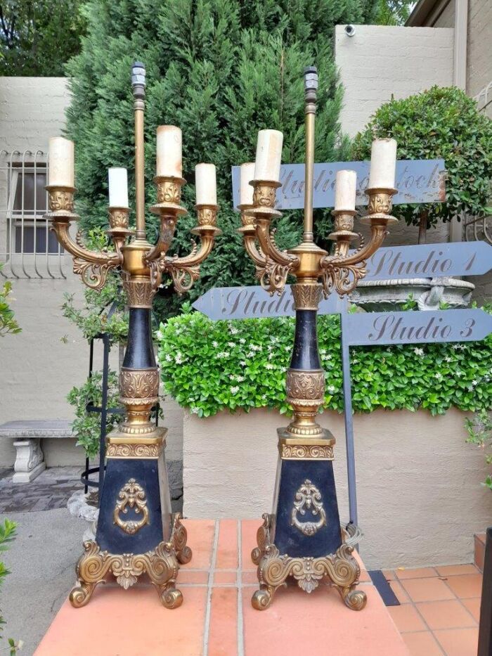 A Mid 20th Century Pair Of French Empire Style Black Metal And Brass Gilt Painted Candelabra Lamps