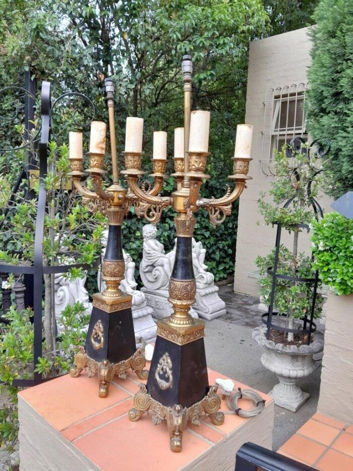 A Mid 20th Century Pair Of French Empire Style Black Metal And Brass Gilt Painted Candelabra Lamps - Image 2