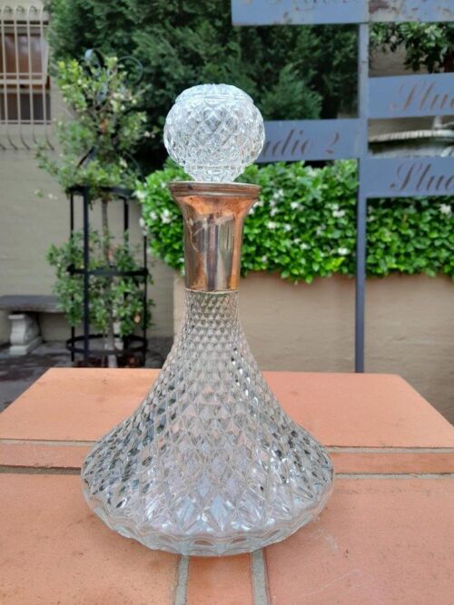 A Hand Blown Crystal Decanter With Stopper