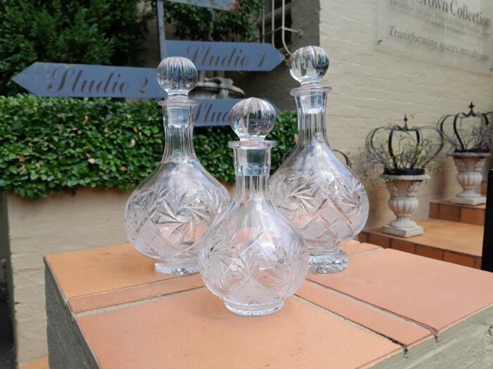 A Set of  Three Neman Cut Crystal Decanters