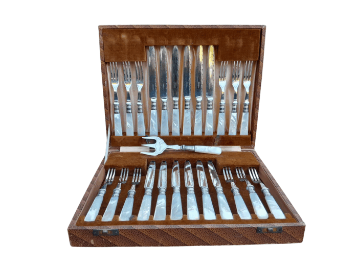 A Late 19th / Early 20th Century Silver Plate Cased Set of Twelve Fruit Forks and Knives and Fruit Server With Mother of Pearl handles