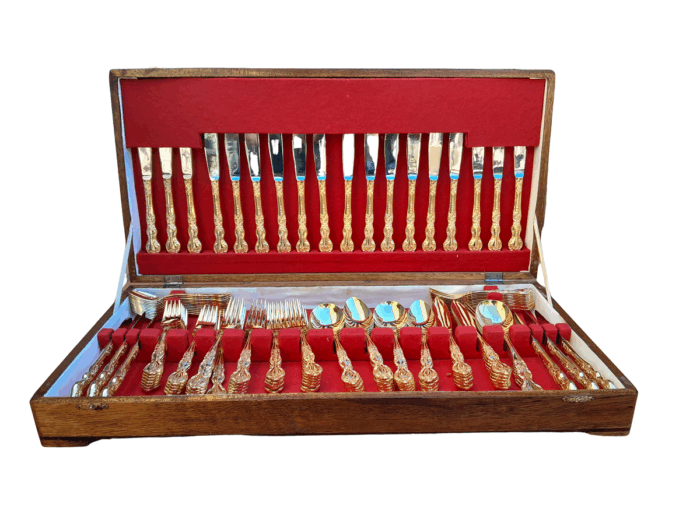 A Canteen Of 24kt 12 Place Ornately Gold Plated Stainless Steel Cutlery Set