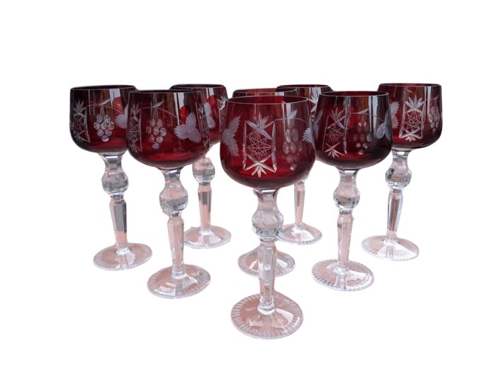 A 20th Century Set Of Eight Burgundy Bohemian Cut Crystal Wine Glasses