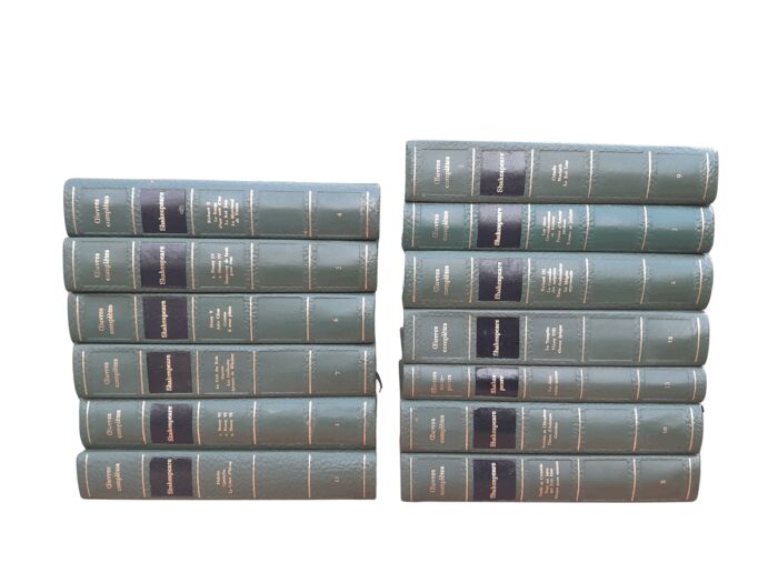 A 20th Century French Set Of Thirteen Volumes Of Shakespeare Covered In Green Leather With Gilded Embossing