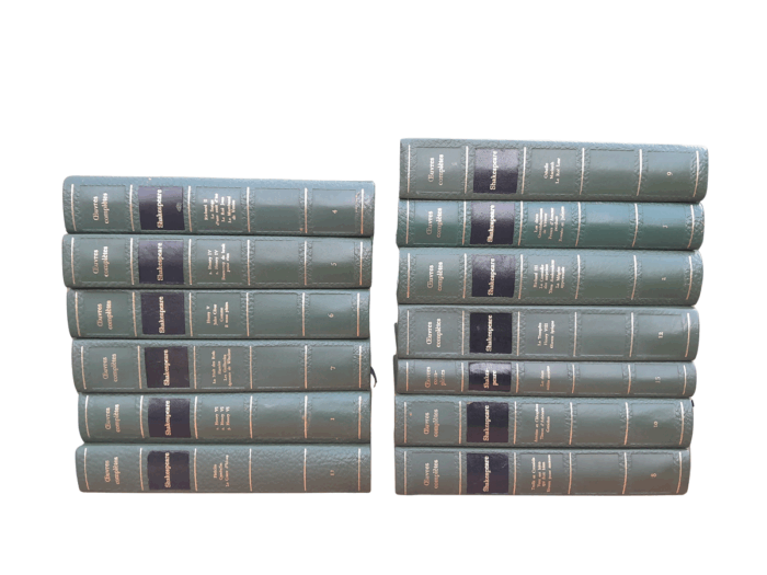 A 20th Century French Set Of Thirteen Volumes Of Shakespeare Covered In Green Leather With Gilded Embossing