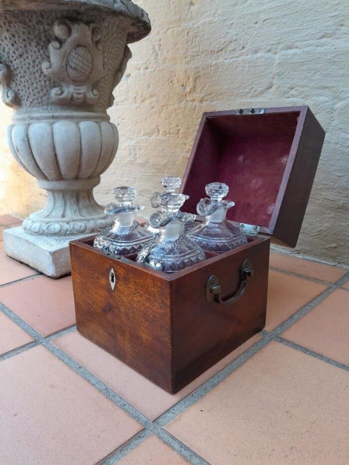 An 18th / Early 19th Century Georgian Mahogany Tantalus With Four Cut Glass Decanters And Three Georgian London Silver Wine Labels - Image 2