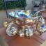 A 20th Century A1 Silver-Plate Punch Bowl With Eight Cups And Hooks And Ladle With Elephant Head