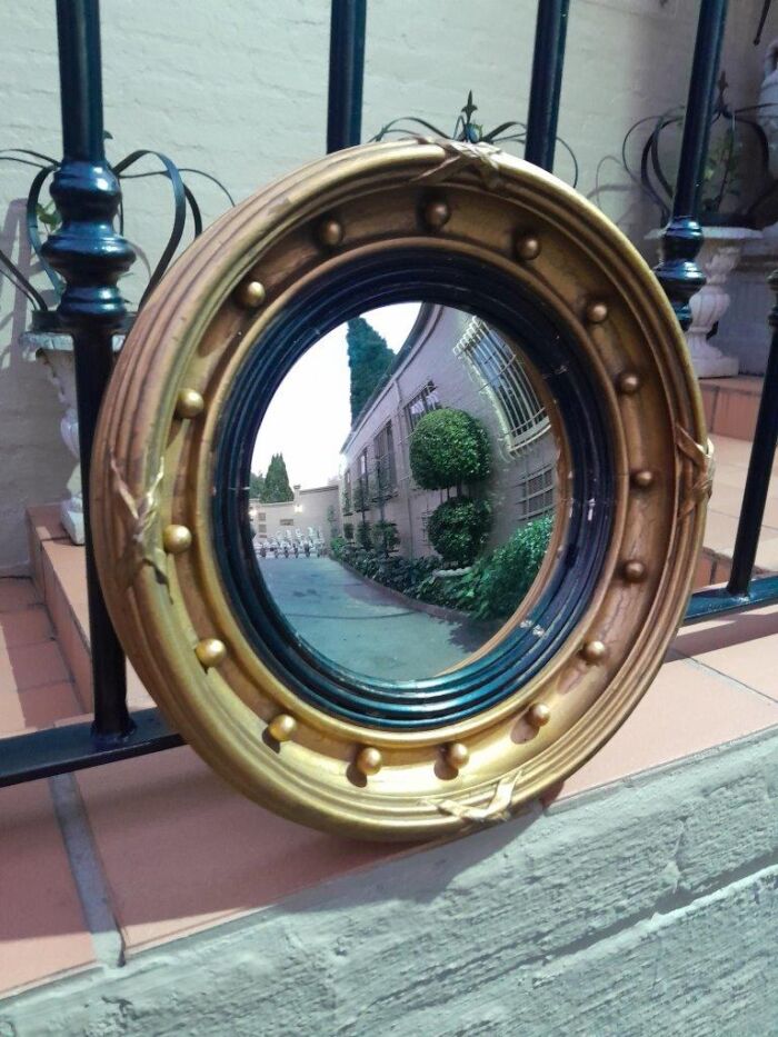 A 20TH Century Regency Style Gilt Painted Ebonised Convex Mirror - Image 2