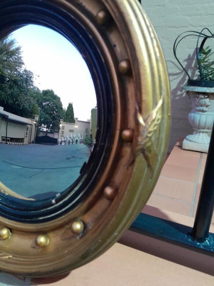 A 20TH Century Regency Style Gilt Painted Ebonised Convex Mirror - Image 4