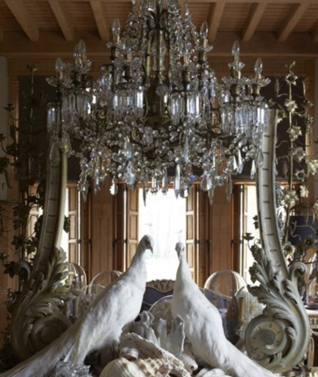 Pairing antique crystal chandeliers with concrete elements at The Crown Collection