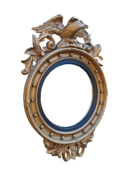 A 20th Century Regency Style Convex Mirror With Eagle Cresting