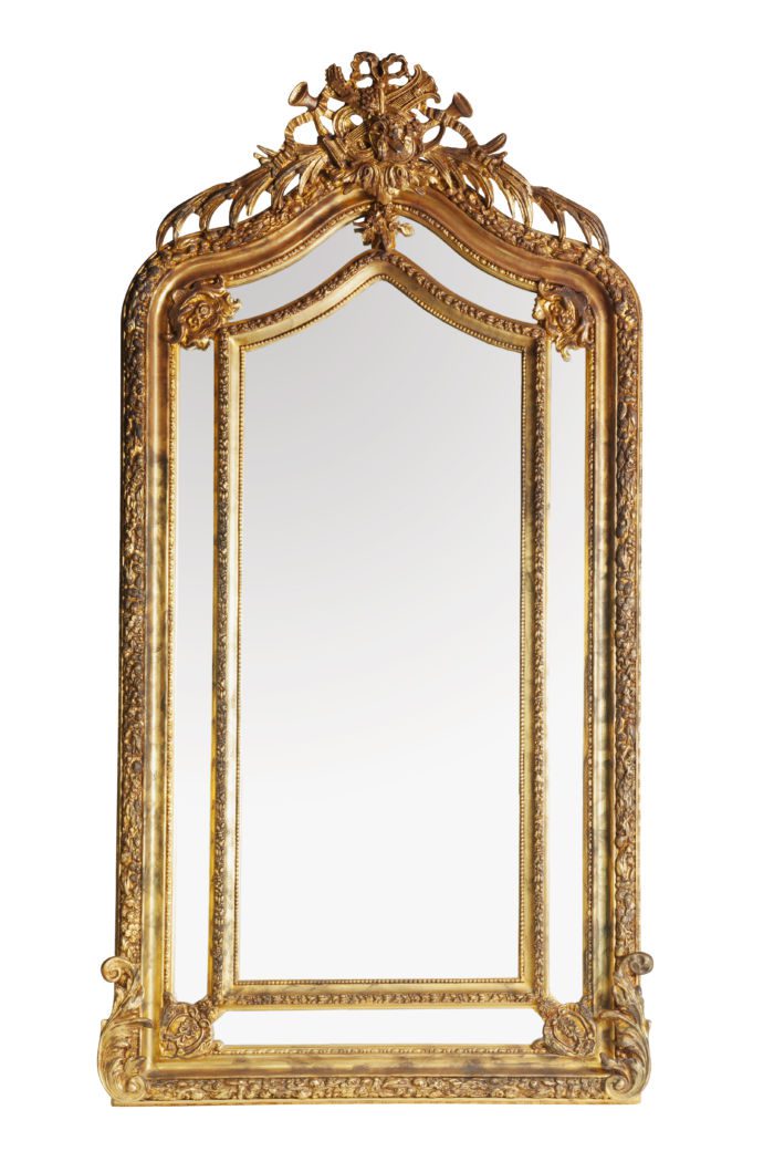 Ornate carved and gilded Bevelled mirror